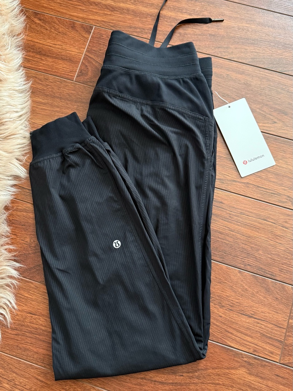 Size 6 Lululemon Dance Studio Mid-Rise Joggers 28”  in black